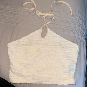 Cream texture halter top.